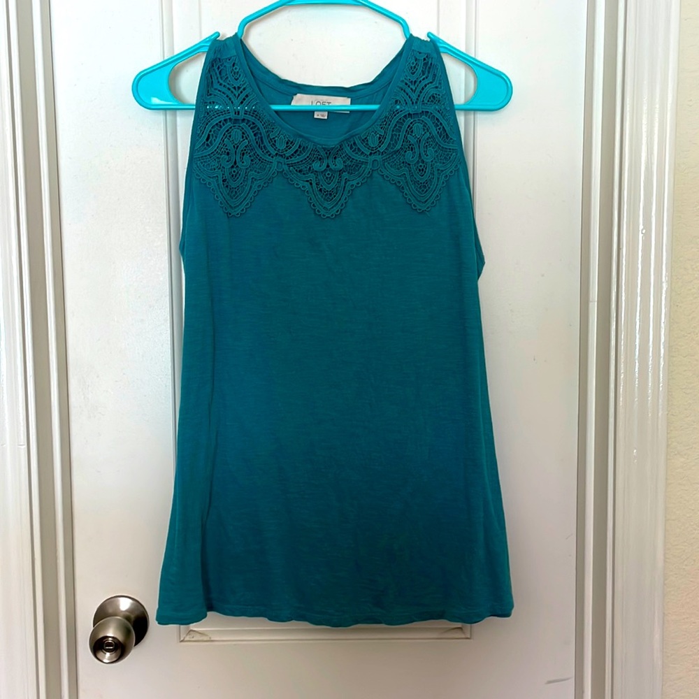 Teal colored sleeveless top